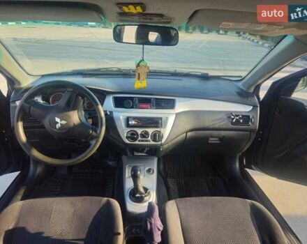 Чорний Міцубісі Lancer, об'ємом двигуна 1.59 л та пробігом 180 тис. км за 4999 $, фото 15 на Automoto.ua
