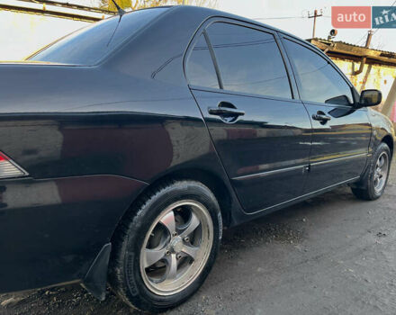 Черный Мицубиси Лансер, объемом двигателя 1.58 л и пробегом 156 тыс. км за 4599 $, фото 10 на Automoto.ua