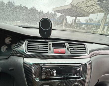 Черный Мицубиси Лансер, объемом двигателя 1.58 л и пробегом 254 тыс. км за 5000 $, фото 23 на Automoto.ua