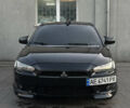Чорний Міцубісі Lancer, об'ємом двигуна 2 л та пробігом 256 тис. км за 5500 $, фото 1 на Automoto.ua