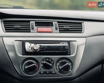 Чорний Міцубісі Lancer, об'ємом двигуна 1.6 л та пробігом 243 тис. км за 4950 $, фото 50 на Automoto.ua