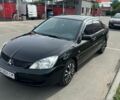 Чорний Міцубісі Lancer, об'ємом двигуна 1.6 л та пробігом 367 тис. км за 3850 $, фото 1 на Automoto.ua