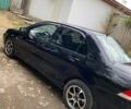 Чорний Міцубісі Lancer, об'ємом двигуна 1.58 л та пробігом 231 тис. км за 4300 $, фото 6 на Automoto.ua