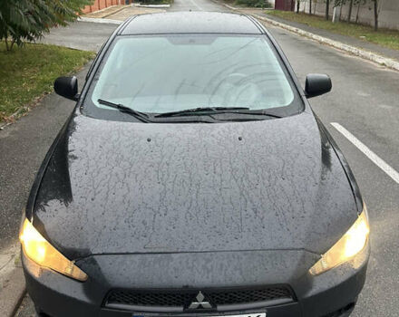 Чорний Міцубісі Lancer, об'ємом двигуна 2 л та пробігом 292 тис. км за 4400 $, фото 3 на Automoto.ua