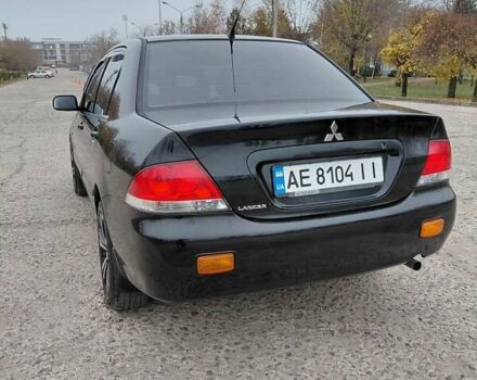 Чорний Міцубісі Lancer, об'ємом двигуна 1.58 л та пробігом 201 тис. км за 4500 $, фото 5 на Automoto.ua