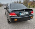 Чорний Міцубісі Lancer, об'ємом двигуна 1.58 л та пробігом 201 тис. км за 4500 $, фото 5 на Automoto.ua