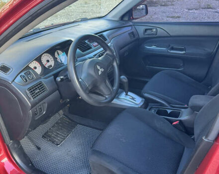 Чорний Міцубісі Lancer, об'ємом двигуна 1.6 л та пробігом 195 тис. км за 5000 $, фото 5 на Automoto.ua