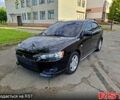 Черный Мицубиси Лансер, объемом двигателя 2 л и пробегом 173 тыс. км за 8500 $, фото 1 на Automoto.ua