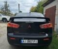 Черный Мицубиси Лансер, объемом двигателя 2 л и пробегом 277 тыс. км за 4650 $, фото 3 на Automoto.ua
