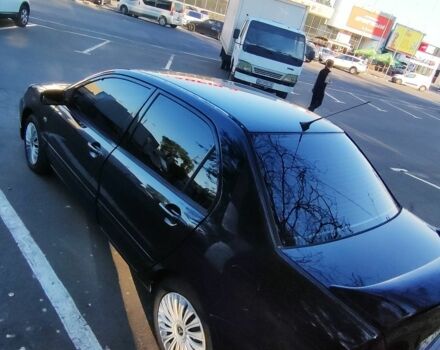 Чорний Міцубісі Lancer, об'ємом двигуна 1.6 л та пробігом 221 тис. км за 4600 $, фото 6 на Automoto.ua