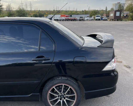 Чорний Міцубісі Lancer, об'ємом двигуна 2 л та пробігом 280 тис. км за 4600 $, фото 19 на Automoto.ua