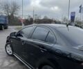 Черный Мицубиси Лансер, объемом двигателя 2 л и пробегом 350 тыс. км за 6700 $, фото 5 на Automoto.ua