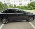 Черный Мицубиси Лансер, объемом двигателя 2 л и пробегом 280 тыс. км за 5500 $, фото 1 на Automoto.ua