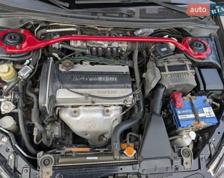 Чорний Міцубісі Lancer, об'ємом двигуна 2 л та пробігом 152 тис. км за 5500 $, фото 21 на Automoto.ua