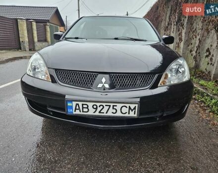 Черный Мицубиси Лансер, объемом двигателя 1.6 л и пробегом 152 тыс. км за 4999 $, фото 5 на Automoto.ua