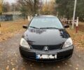 Чорний Міцубісі Lancer, об'ємом двигуна 1.6 л та пробігом 30 тис. км за 5500 $, фото 1 на Automoto.ua