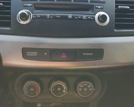 Черный Мицубиси Лансер, объемом двигателя 1.5 л и пробегом 240 тыс. км за 6900 $, фото 7 на Automoto.ua