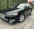 Чорний Міцубісі Lancer, об'ємом двигуна 2 л та пробігом 69 тис. км за 6200 $, фото 1 на Automoto.ua