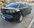 Чорний Міцубісі Lancer, об'ємом двигуна 1.5 л та пробігом 242 тис. км за 5550 $, фото 22 на Automoto.ua