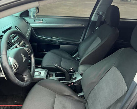 Черный Мицубиси Лансер, объемом двигателя 2 л и пробегом 350 тыс. км за 6700 $, фото 14 на Automoto.ua