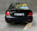 Чорний Міцубісі Lancer, об'ємом двигуна 1.58 л та пробігом 135 тис. км за 4100 $, фото 4 на Automoto.ua