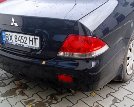 Черный Мицубиси Лансер, объемом двигателя 1.6 л и пробегом 223 тыс. км за 4300 $, фото 7 на Automoto.ua