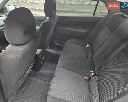 Черный Мицубиси Лансер, объемом двигателя 1.6 л и пробегом 152 тыс. км за 4999 $, фото 2 на Automoto.ua