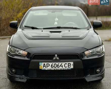 Черный Мицубиси Лансер, объемом двигателя 2 л и пробегом 215 тыс. км за 5500 $, фото 2 на Automoto.ua
