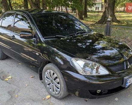 Чорний Міцубісі Lancer, об'ємом двигуна 1.6 л та пробігом 366 тис. км за 3500 $, фото 7 на Automoto.ua