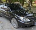 Чорний Міцубісі Lancer, об'ємом двигуна 1.6 л та пробігом 366 тис. км за 3500 $, фото 7 на Automoto.ua