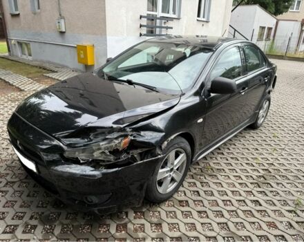 Чорний Міцубісі Lancer, об'ємом двигуна 2 л та пробігом 245 тис. км за 3500 $, фото 1 на Automoto.ua