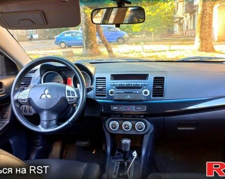 Черный Мицубиси Лансер, объемом двигателя 2 л и пробегом 290 тыс. км за 5800 $, фото 4 на Automoto.ua