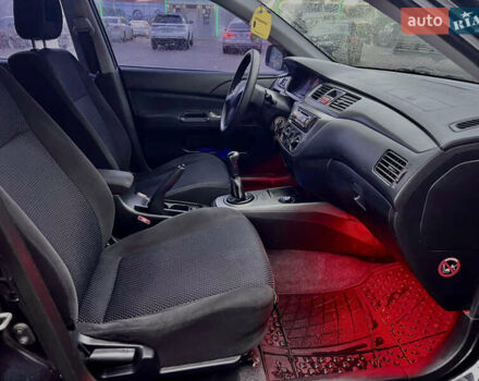 Чорний Міцубісі Lancer, об'ємом двигуна 1.6 л та пробігом 303 тис. км за 4350 $, фото 24 на Automoto.ua