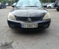 Чорний Міцубісі Lancer, об'ємом двигуна 1.6 л та пробігом 420 тис. км за 3650 $, фото 1 на Automoto.ua
