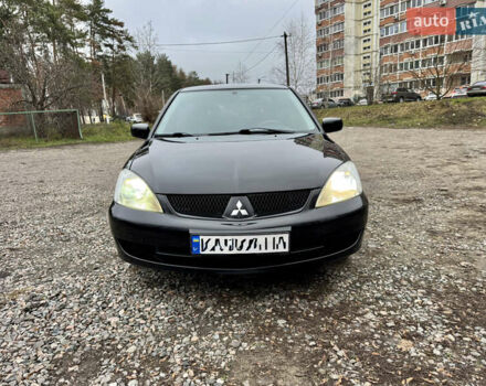 Черный Мицубиси Лансер, объемом двигателя 1.6 л и пробегом 216 тыс. км за 4990 $, фото 7 на Automoto.ua
