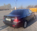 Чорний Міцубісі Lancer, об'ємом двигуна 1.58 л та пробігом 201 тис. км за 5000 $, фото 1 на Automoto.ua