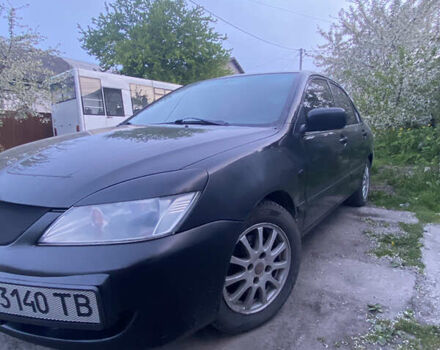Чорний Міцубісі Lancer, об'ємом двигуна 1.6 л та пробігом 195 тис. км за 5200 $, фото 28 на Automoto.ua