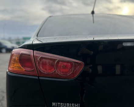 Чорний Міцубісі Lancer, об'ємом двигуна 1.5 л та пробігом 209 тис. км за 5500 $, фото 11 на Automoto.ua