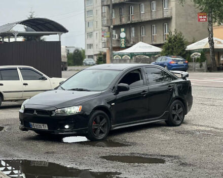 Черный Мицубиси Лансер, объемом двигателя 2 л и пробегом 333 тыс. км за 7300 $, фото 15 на Automoto.ua