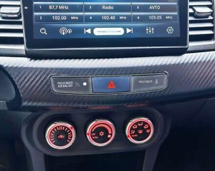 Черный Мицубиси Лансер, объемом двигателя 2 л и пробегом 230 тыс. км за 7100 $, фото 11 на Automoto.ua