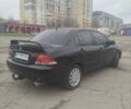 Черный Мицубиси Лансер, объемом двигателя 1.6 л и пробегом 310 тыс. км за 5700 $, фото 5 на Automoto.ua