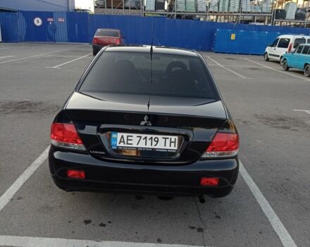 Черный Мицубиси Лансер, объемом двигателя 1.6 л и пробегом 301 тыс. км за 4300 $, фото 3 на Automoto.ua