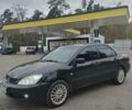 Чорний Міцубісі Lancer, об'ємом двигуна 1.58 л та пробігом 190 тис. км за 3750 $, фото 2 на Automoto.ua