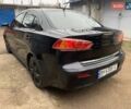 Чорний Міцубісі Lancer, об'ємом двигуна 2 л та пробігом 216 тис. км за 6200 $, фото 2 на Automoto.ua