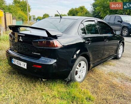 Чорний Міцубісі Lancer, об'ємом двигуна 2 л та пробігом 284 тис. км за 6200 $, фото 3 на Automoto.ua