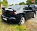 Чорний Міцубісі Lancer, об'ємом двигуна 2 л та пробігом 284 тис. км за 6200 $, фото 3 на Automoto.ua