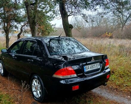 Чорний Міцубісі Lancer, об'ємом двигуна 1.6 л та пробігом 240 тис. км за 4700 $, фото 2 на Automoto.ua