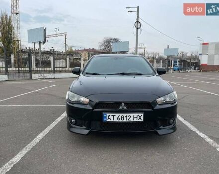 Черный Мицубиси Лансер, объемом двигателя 2 л и пробегом 246 тыс. км за 7500 $, фото 9 на Automoto.ua