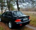 Черный Мицубиси Лансер, объемом двигателя 1.6 л и пробегом 240 тыс. км за 4700 $, фото 2 на Automoto.ua