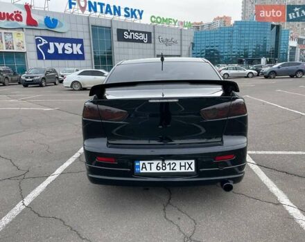 Черный Мицубиси Лансер, объемом двигателя 2 л и пробегом 246 тыс. км за 7500 $, фото 4 на Automoto.ua